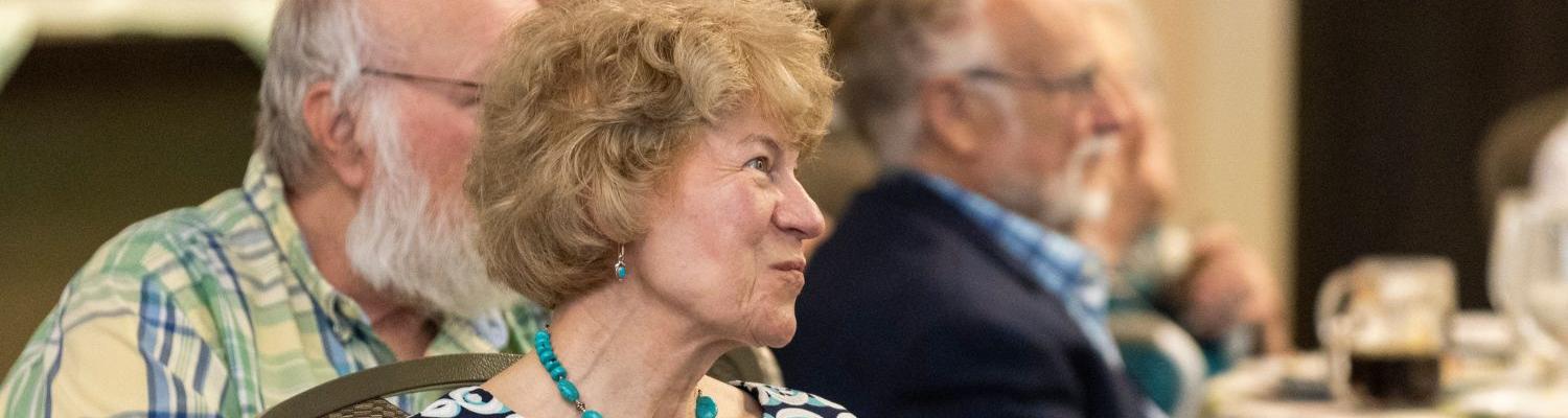 A member of the Herrick Society attends the annual luncheon in September 2025.