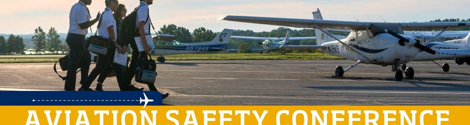 Aviation Safety Conference with photo of pilots walking toward planes at sundown.