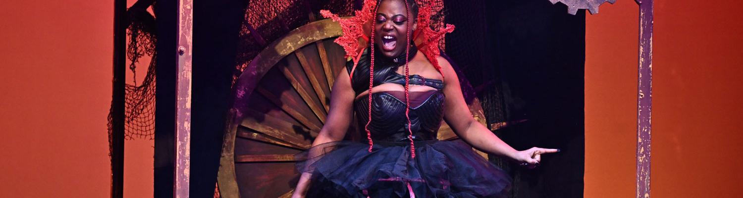 Student performs on stage in The Wiz