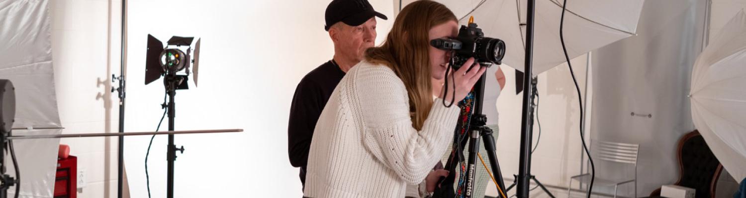 Students doing photography in studio