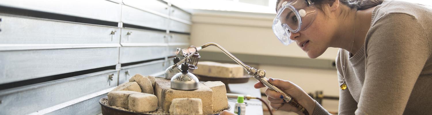 Jewelry/Metals/Enameling student soldering a ring