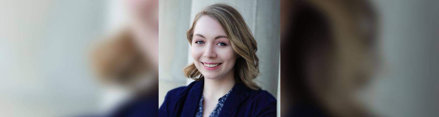 Photo of student (Gracen) posed and smiling for the camera