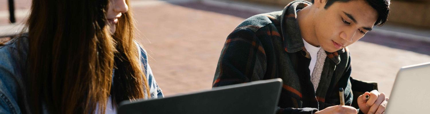 Photo of students studying on campus 