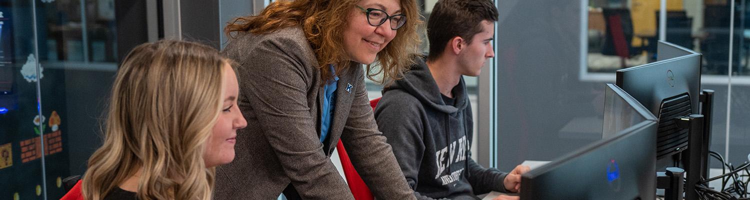 Engineering students use computers in the Cyber Range classroom