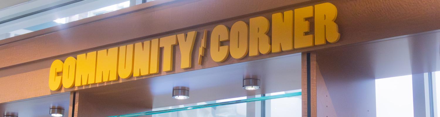 Closeup of the Community Corner sign