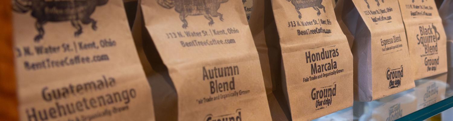 Close up of bags of coffee from Bent Tree Coffee Roasters for sale at the Community Corner