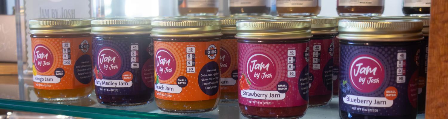 Closeup of some jam jars available for purchase at the Community Corner