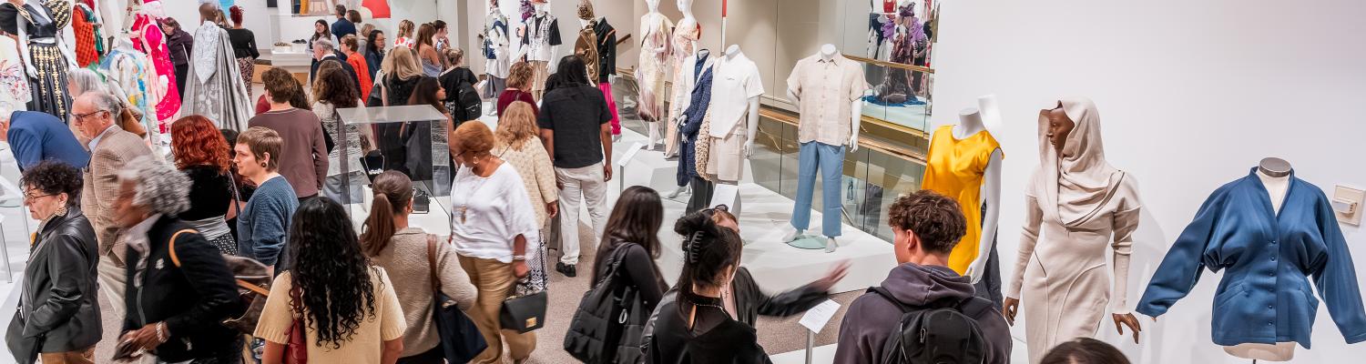 Image of a crowd of people in the KSU Museum
