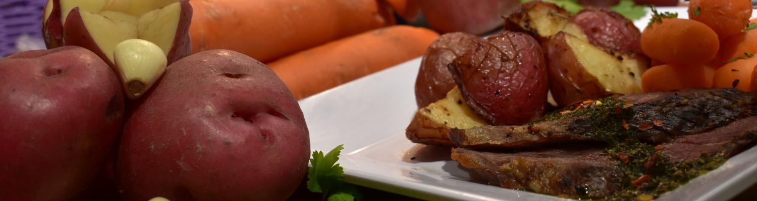 Piles of ingredients next to plated food
