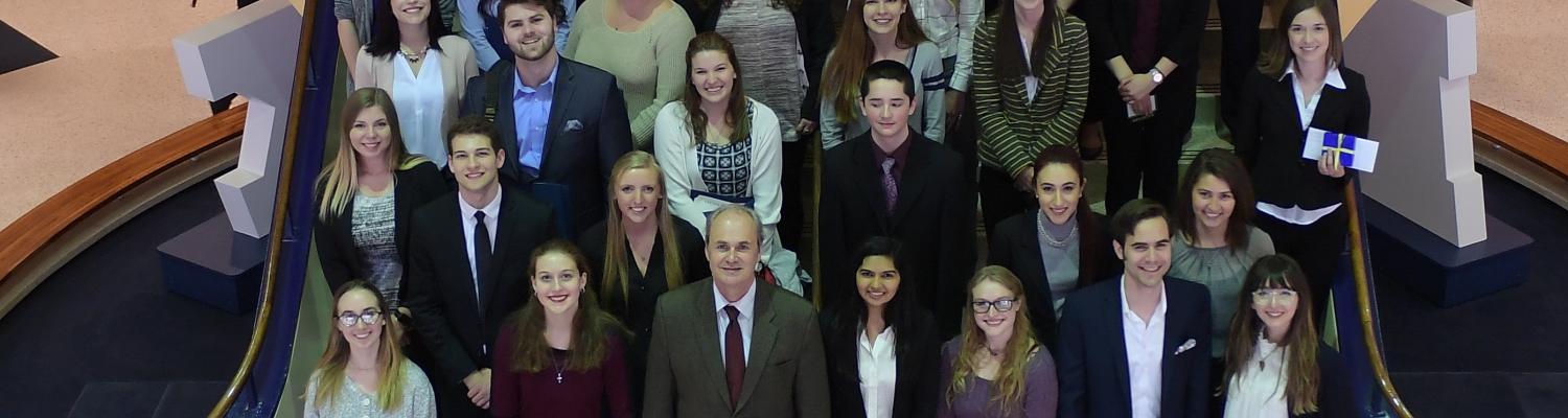 Kent State undergraduates pose with University officials following award presentations at the 2017 Undergraduate Research Symposium