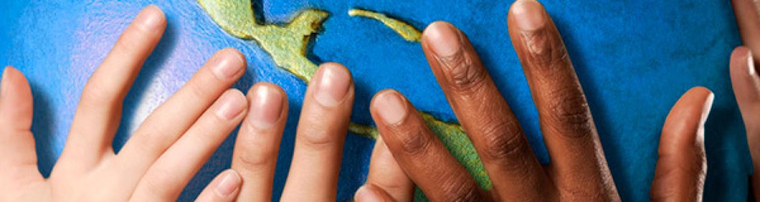 Hands holding up the earth