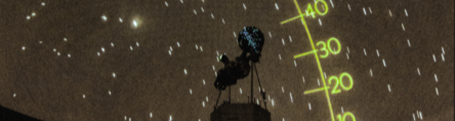 people enjoying a planetarium show
