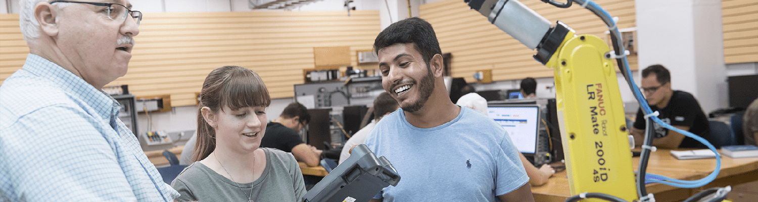 Darwin Boyd using a FANUC robot