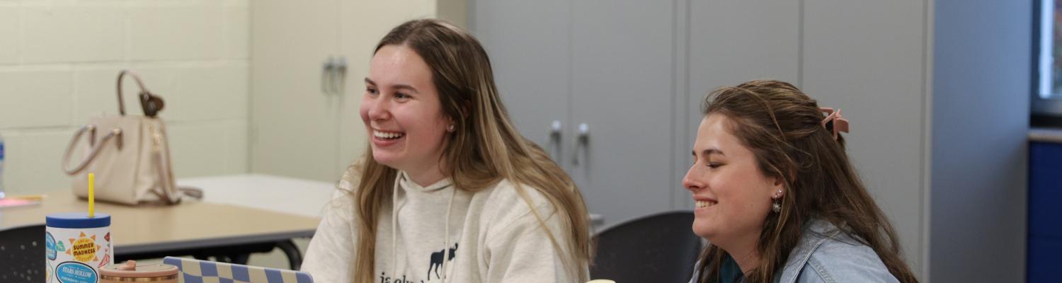 Special Education students smiling during a class.