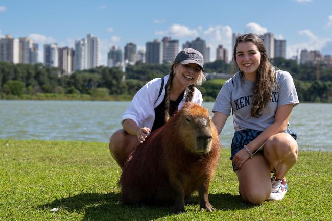 Students in Brazil with a capybara