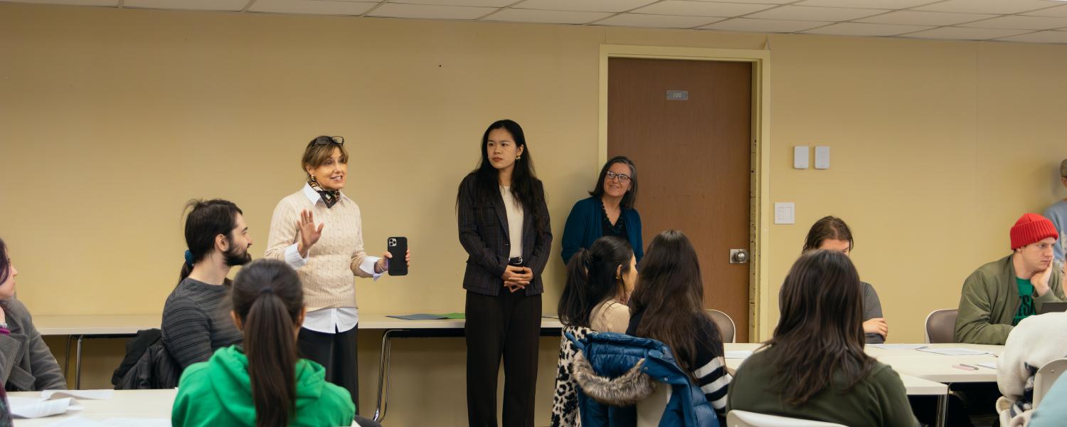 Counselor Education and Supervision faculty speaking to master's students during orientation at ������.