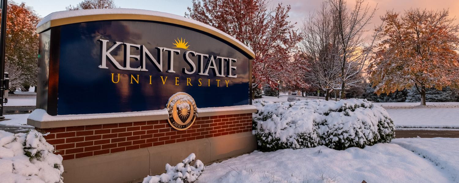 Campus sign in November snow