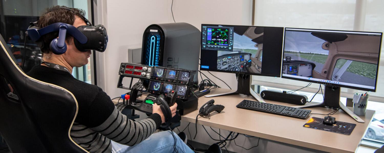 Student uses Augmented Reality headset in flight simulation