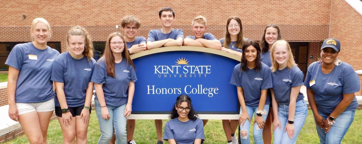 Honors Leadership Academic students in front of Honors College Sign