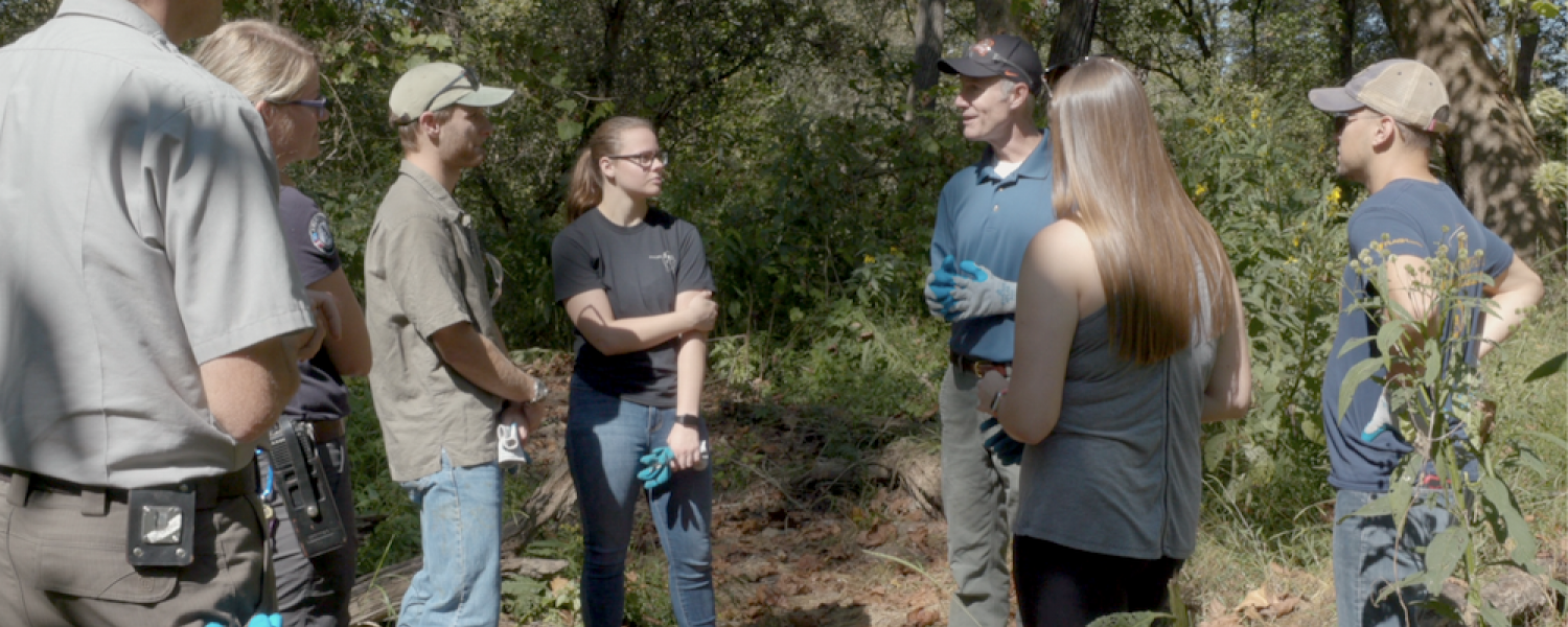 Dr. Andrew Lepp speaks to a group of students during an outdoor lesson in Cuyahoga Valley National Park.
