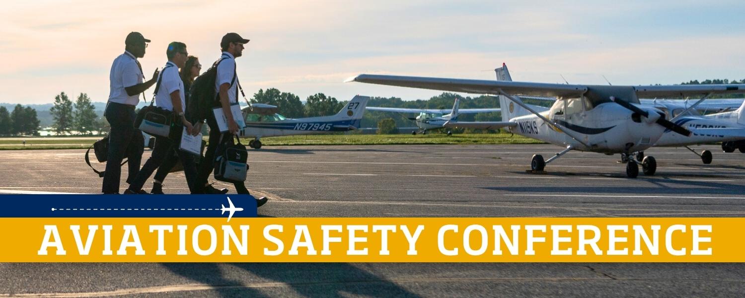 Aviation Safety Conference with photo of pilots walking toward planes at sundown.