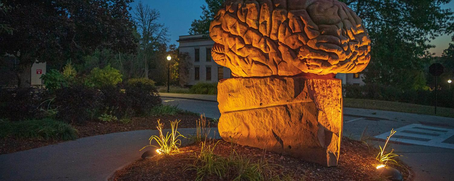 brain statue in front of merrill hall 