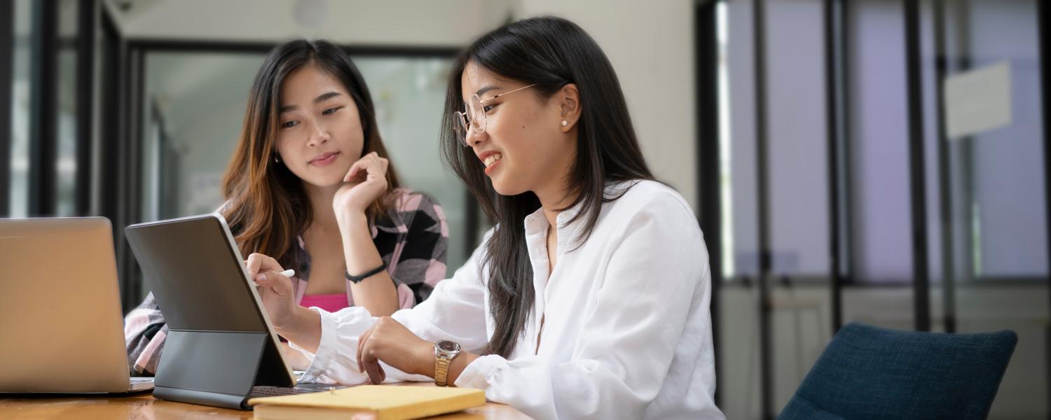 Students working together on a project. 