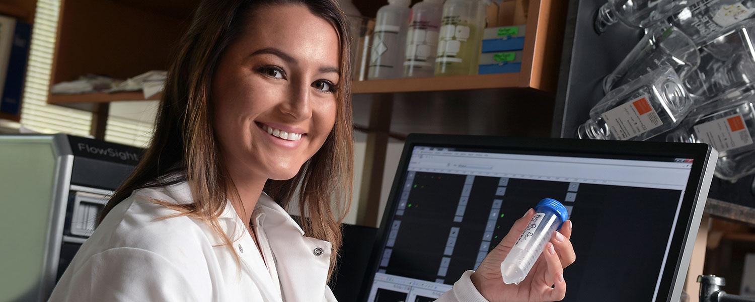 Biology student performing an experiment.
