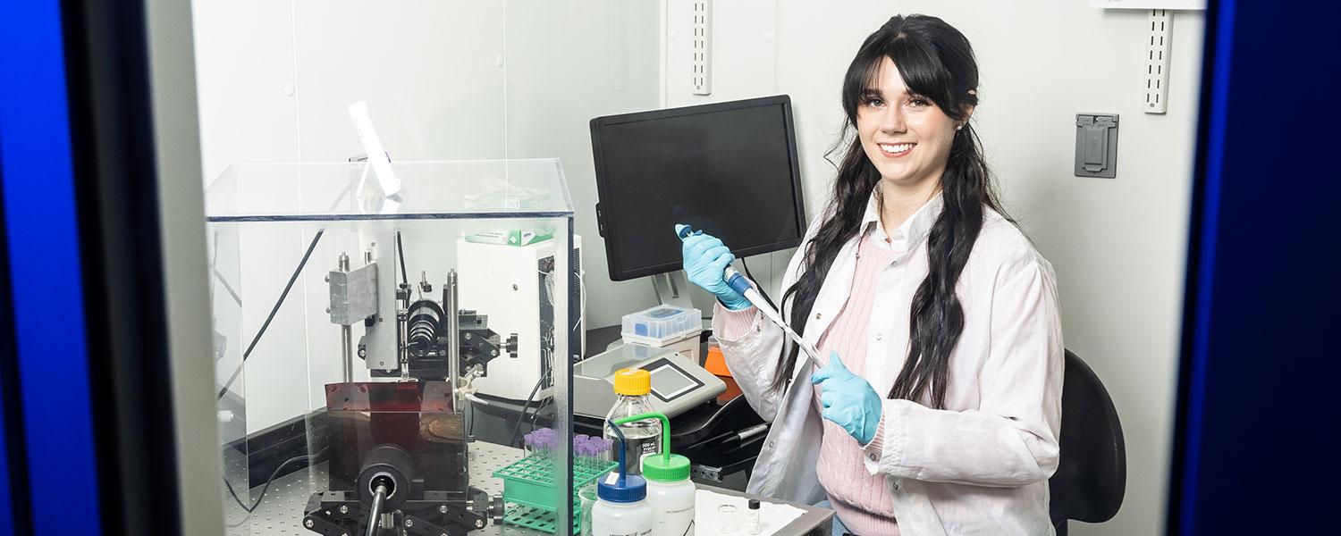 Biology graduate earns doctorate at age 25.