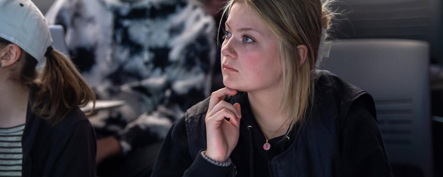 Students listening to a lecture in a classroom