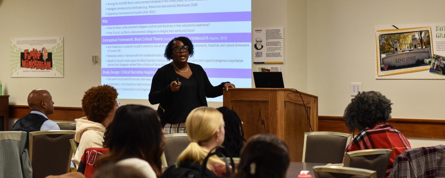 A presenter leads their session during the Reimainging the Academy Conference