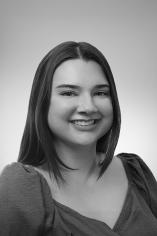 Alex Schueszler headshot