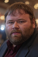 Professional headshot of Michael Mouser