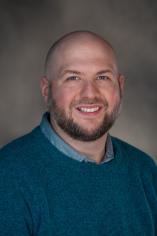 Professional headshot of Troy Williams