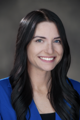 A portrait of Lauren Lemley wearing a blue jacket