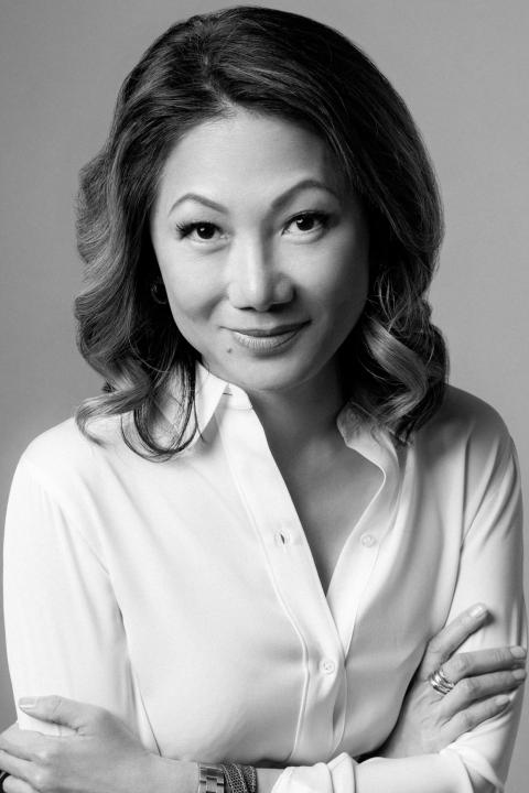 Black and white headshot of Angela