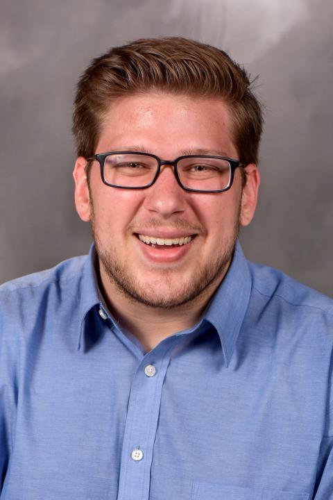 Professional headshot of Bradley Halverson