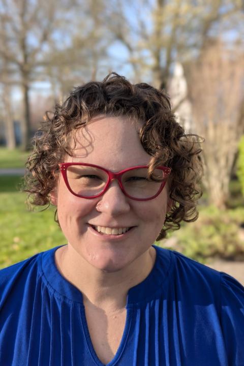 a women smiles for a photograph