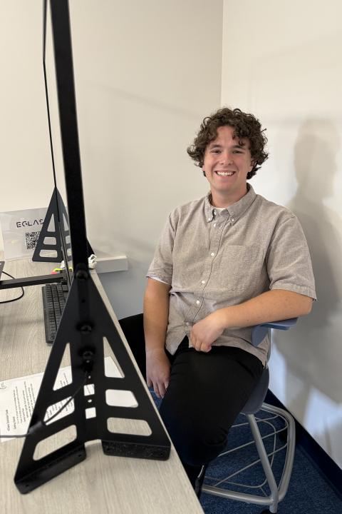 Ethan Montoya sitting next to cleartouch