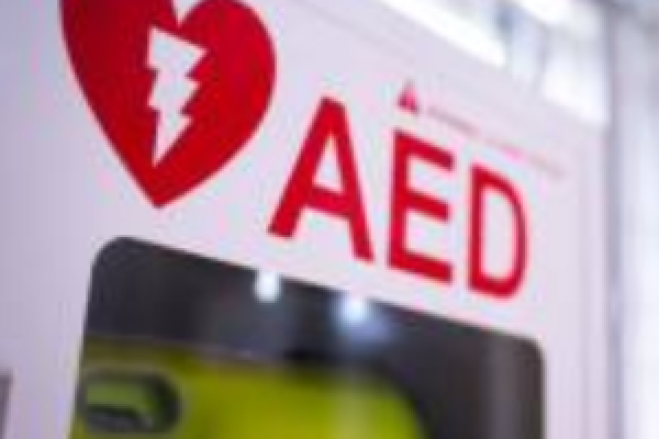 A closeup of an Automated External Defibrillator (AED).