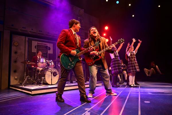 actors on stage for "School of Rock"