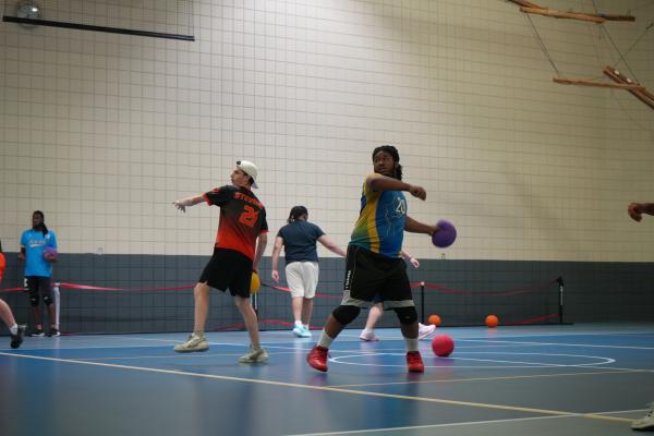 Vice President Carlton Pittman Prepares to throw a dodgeball during practice