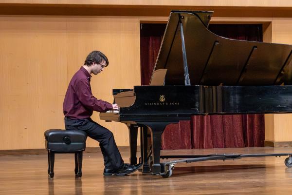 man playing piano