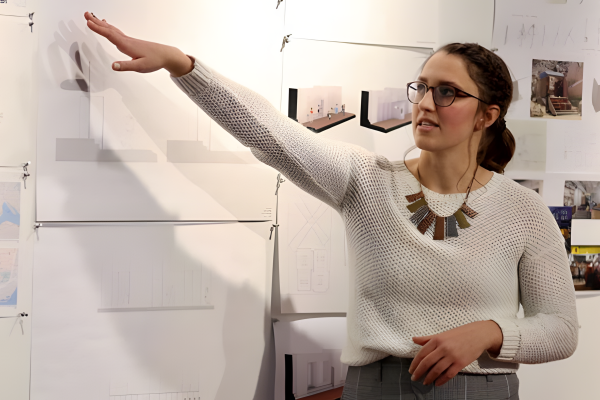 Photo of Interior Design professor in a classroom.