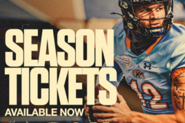 A closeup of a Kent State football player with text overlay that reads "Season Tickets."