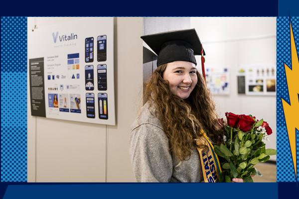 ���ϲ����� graduate Luana Johnson with her research poster
