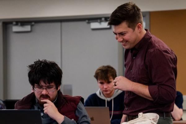 Professorspeaks to students