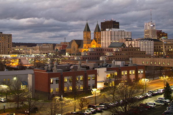 The Akron skyline in front of a cloudy sky