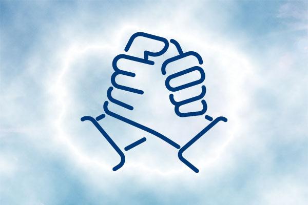 Two hands clasped together