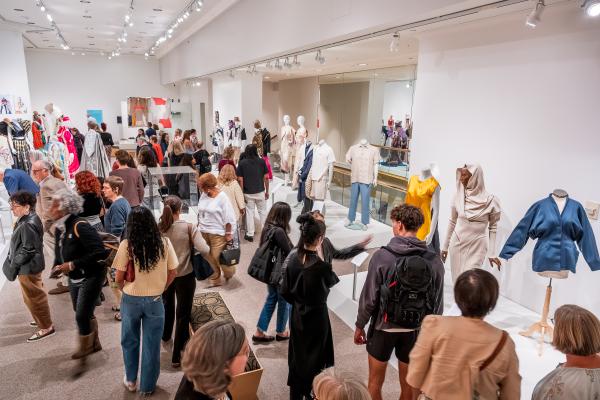 Image of a crowd of people in the KSU Museum